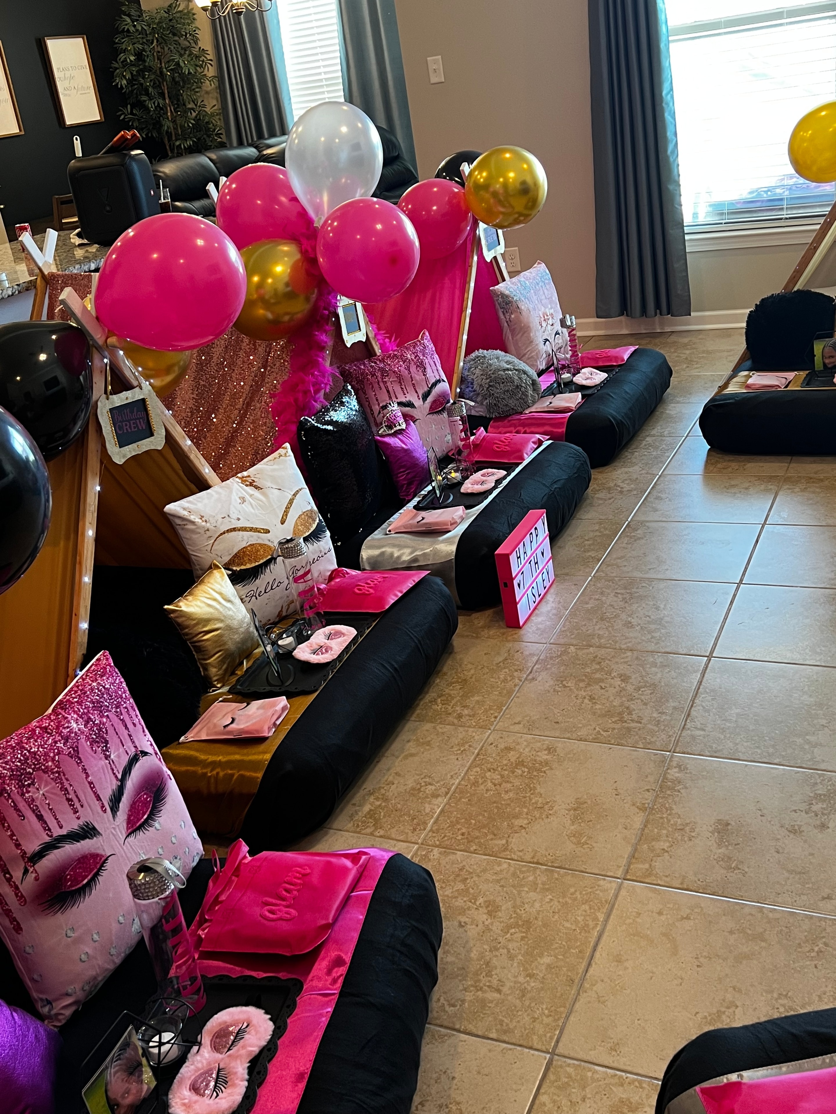 Pink and gold party favor display setup